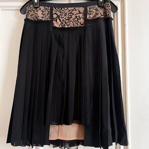 Elegant Black Pleated Skirt with Lace Detail fully lined